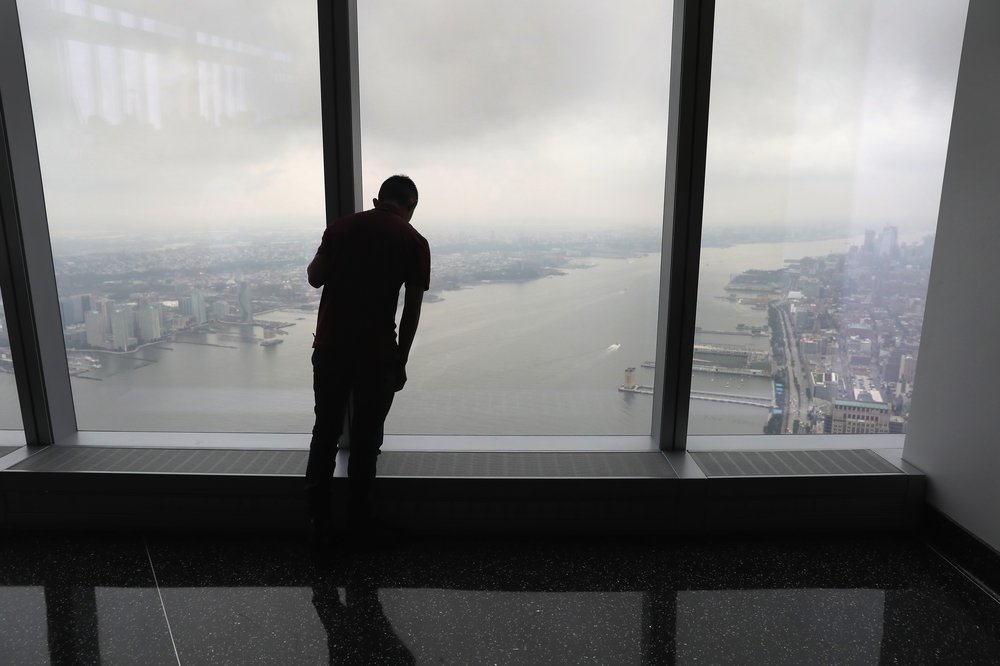 efe0c6437gettyimages-831859460-jpg.jpeg New Americans take part in a naturalization ceremony held in the observatory of the One World Trade Center<br>