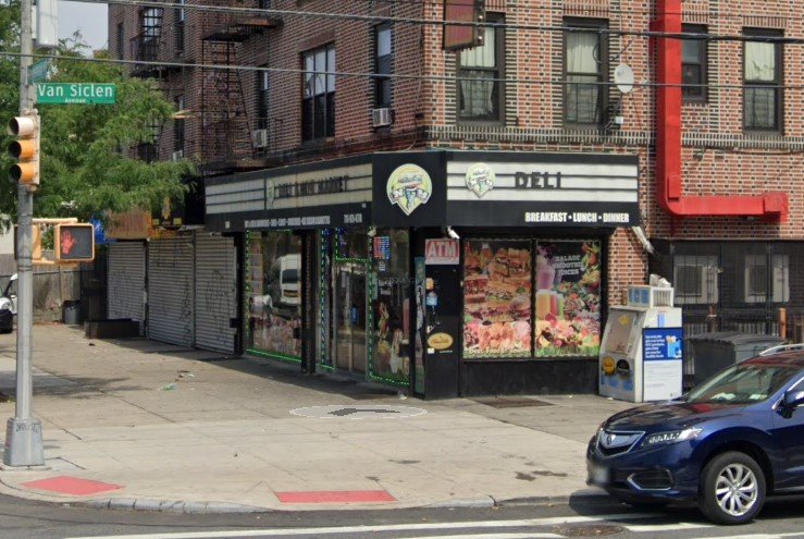 A corner store with a black and white awning on Van Siclen Avenue.