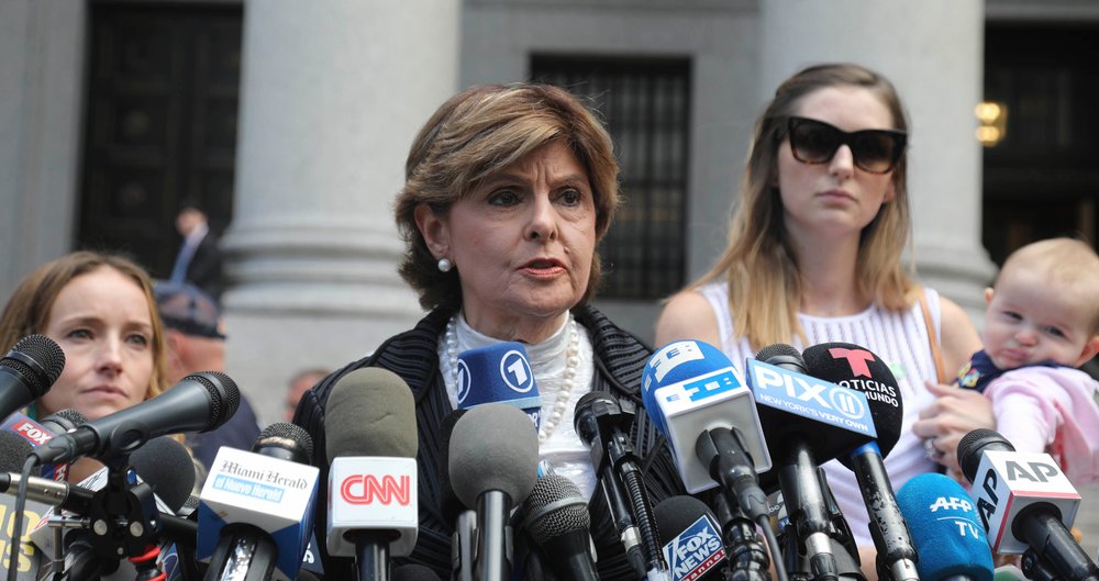 This is an image of attorney Gloria Allred, standing outside a hearing where prosecutors moved to dismiss the charges against Jeffrey Epstein.