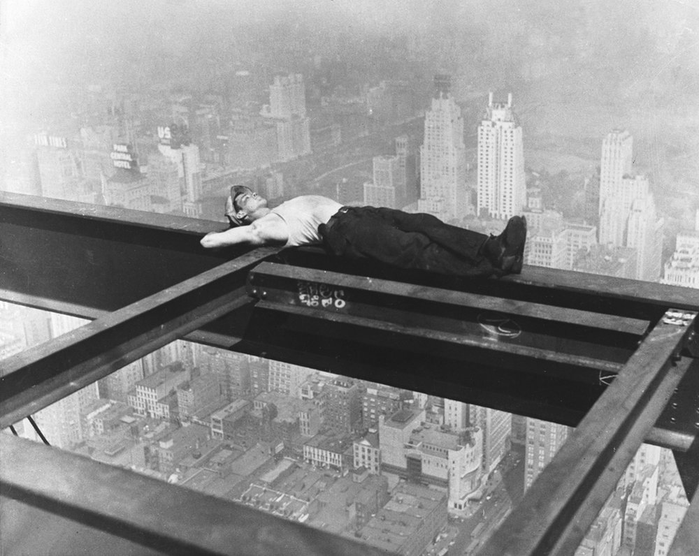 f0ebbbb1a.jpeg A workman takes a siesta on a girder during the building of Radio City, the city of New York spread out below, 1933.