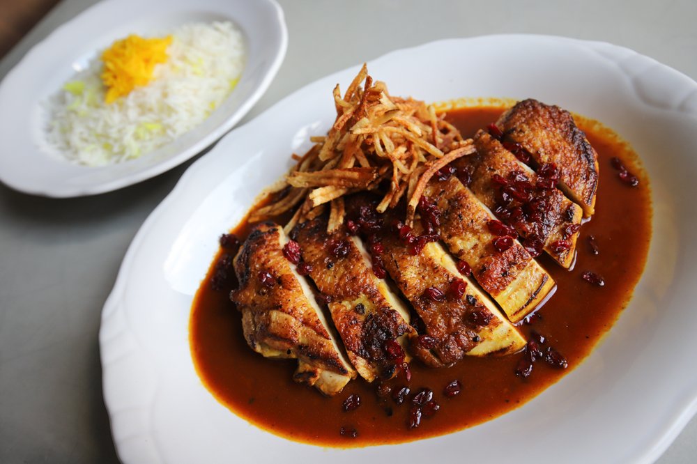 Persian Plum Chicken: Persian plum and saffron sauce, zereshk/barberries, string fries & a side of saffron basmati rice<br/>