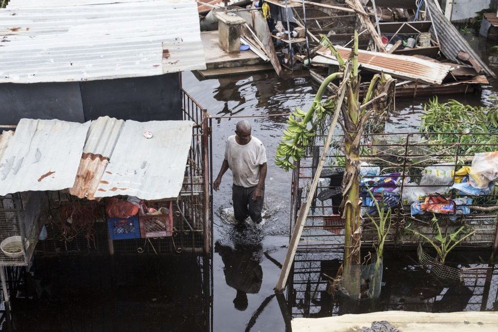 f12a3d7b3092517gettypuertorico6-jpg.jpeg A resident wades through flood water days after Hurricane Maria made landfall, on Friday, September 22nd in Loiza, Puerto Rico. (Alex Wroblewski/Getty Images)
