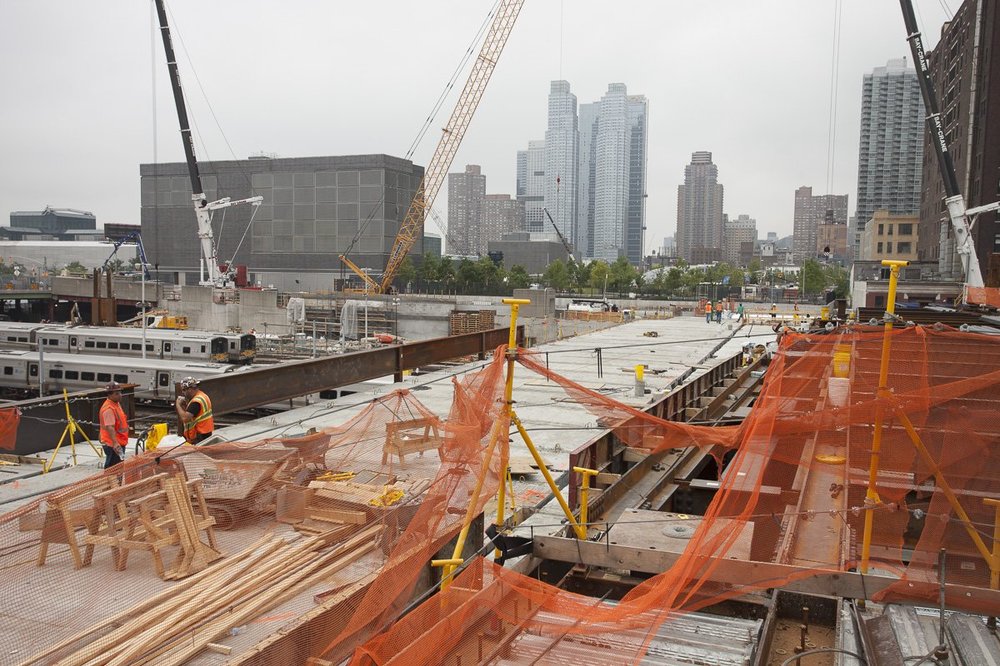 Let's step right into the middle of the Yards.  This is looking north.  You can see the clamshell of the soon-to-be-open 7 train extension station peeking out in the center.  Beyond that are a few blocks of new city park, which will lead into the Public Square, a large open area at Hudson Yards that will be in the foreground here.<br/>