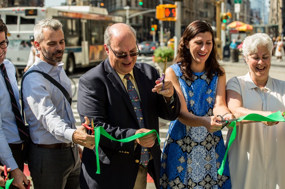 f321126df080917newsafestreetsflatiron-3-jpg.jpeg City officials and local business leaders cut a ceremonial ribbon at the opening of the Shared Streets area.</br>
