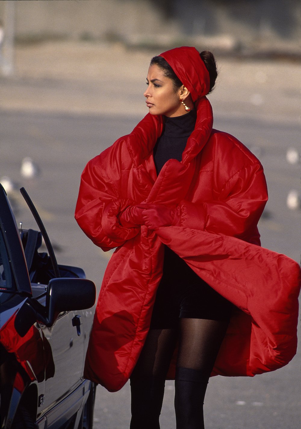 Designer Norma Kamali in a Sleeping Bag Coat, Elle, September 1990. Photograph by Gilles Bensimon. Courtesy Gilles Bensimon