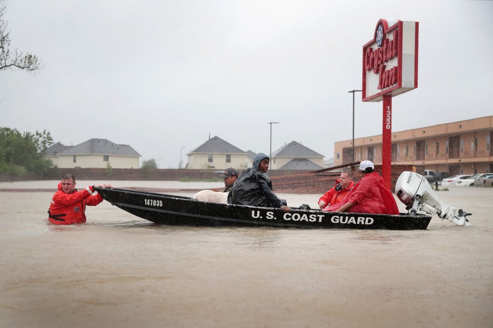 f75940417gettyimages-840345058-jpg.jpeg People are rescued from a flooded neighborhood after it was inundated with rain water, remnants of Hurricane Harvey, on August 28, 2017 in Houston, Texas<br>