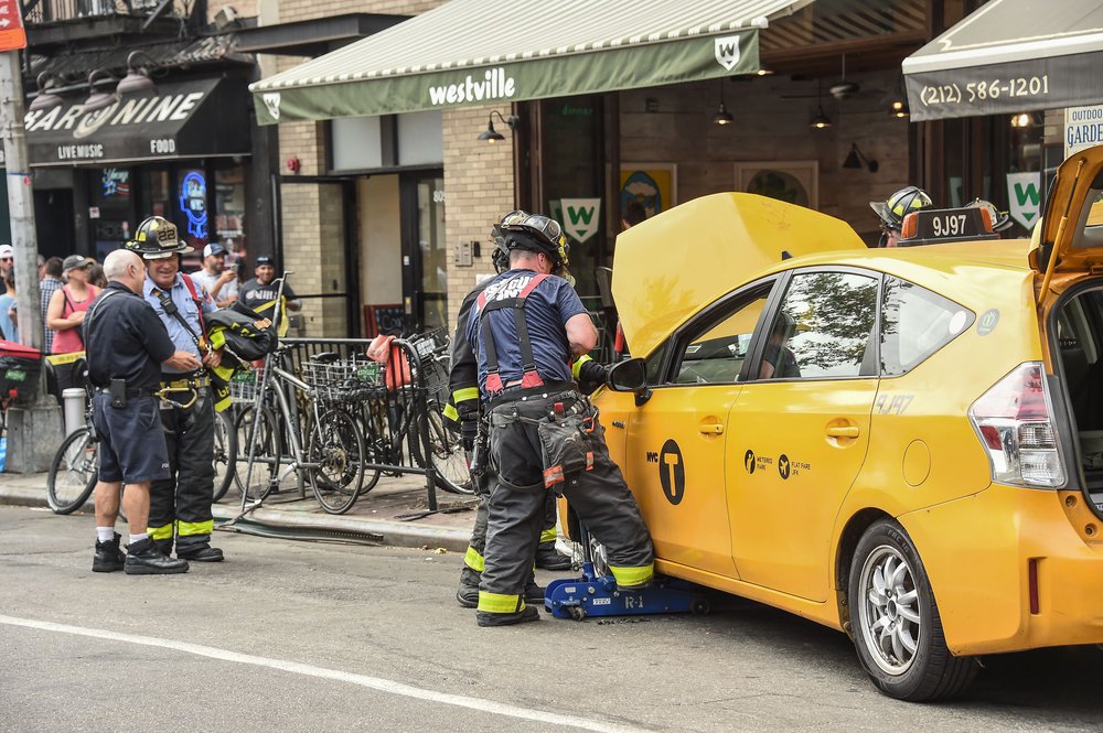 fdf9710b1shutterstock_10332465i-jpg.jpeg Firefighters at the scene of the crash<br>