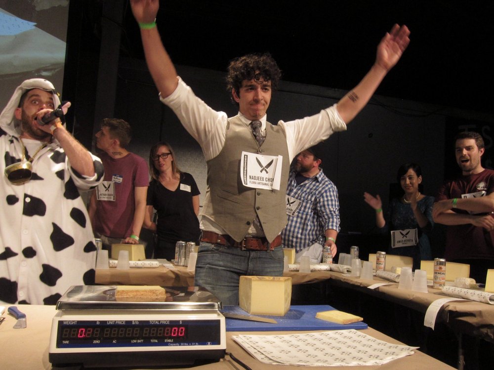 fe11205de.jpeg Nadjeeb Chouaf of Floral Artisanal Cheese in Charlottesville correctly cuts a perfect 1/4 pound<br>