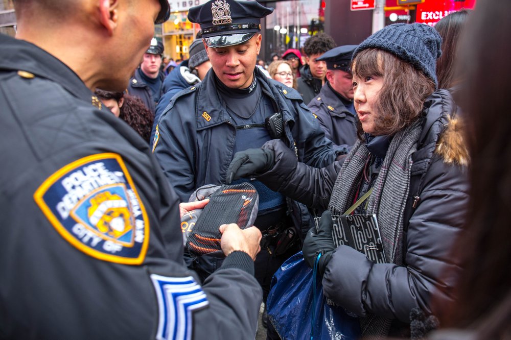 fe6b9d0fdnyeday-67-jpg.jpeg A tiny chair, purchased minutes ago is confiscated (Scott Lynch / Gothamist)