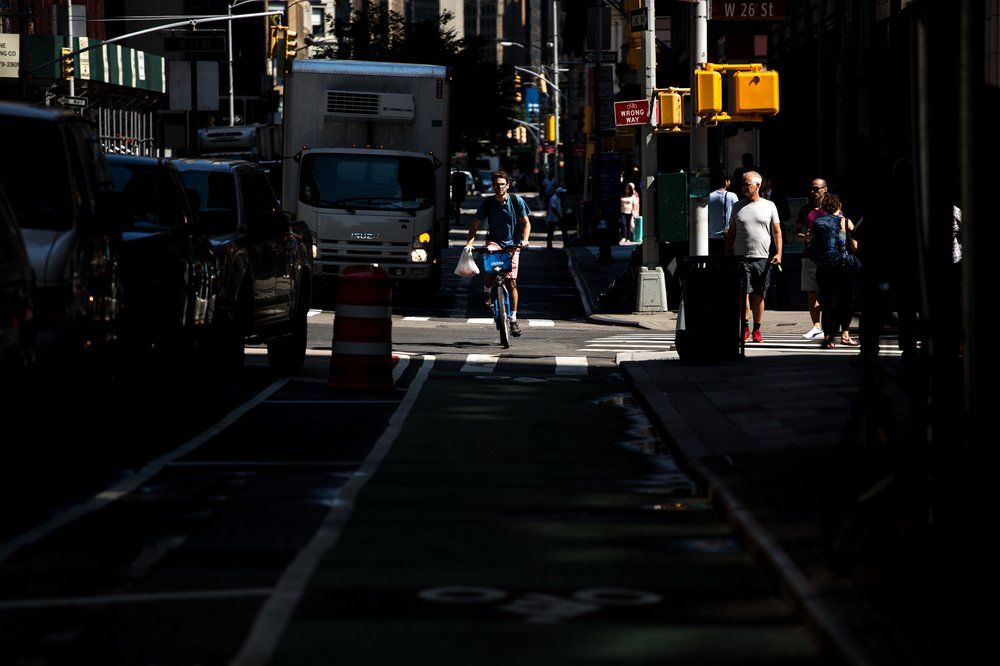 ff4539c6c080917newsafestreetsflatiron-6-jpg.jpeg A Citibike rider enters a new protected bike lane on Broadway south of West 26th Street.</br>