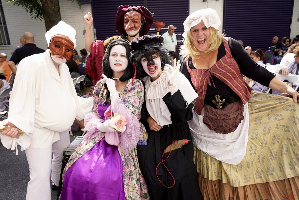 Troupe members wear their Commedia dell’Arte masks at the Ferragosto festival in the Bronx.