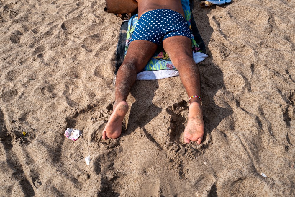 People try to stay cool at the beach at Coney Island in Brooklyn on Aug. 8, 2022.