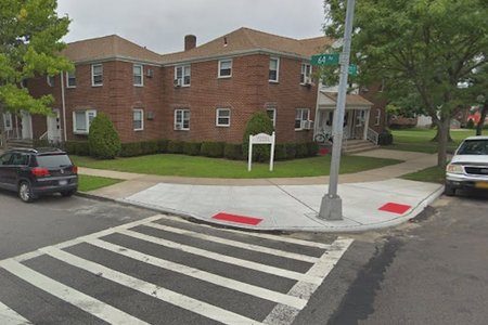 The Queens intersection where a motorist hit a woman crossing the street with her family, leaving her in critical condition.