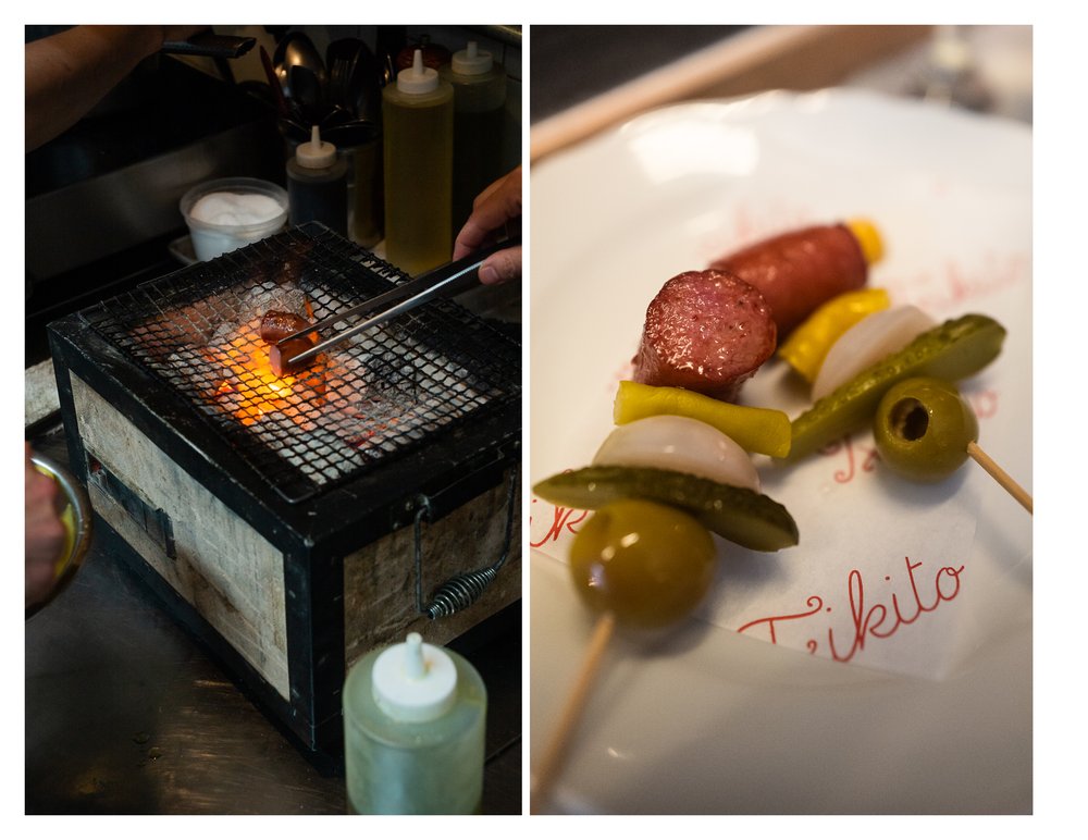A diptych of hands grilling small hotdogs over an open flame, and a skewer featuring mall hot dogs and olives.