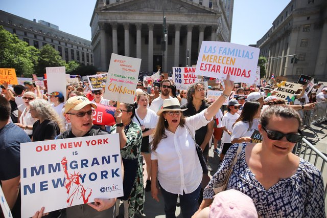 New Yorkers protest President Trump's immigration policies at a march in Lower Manhattan in late June
