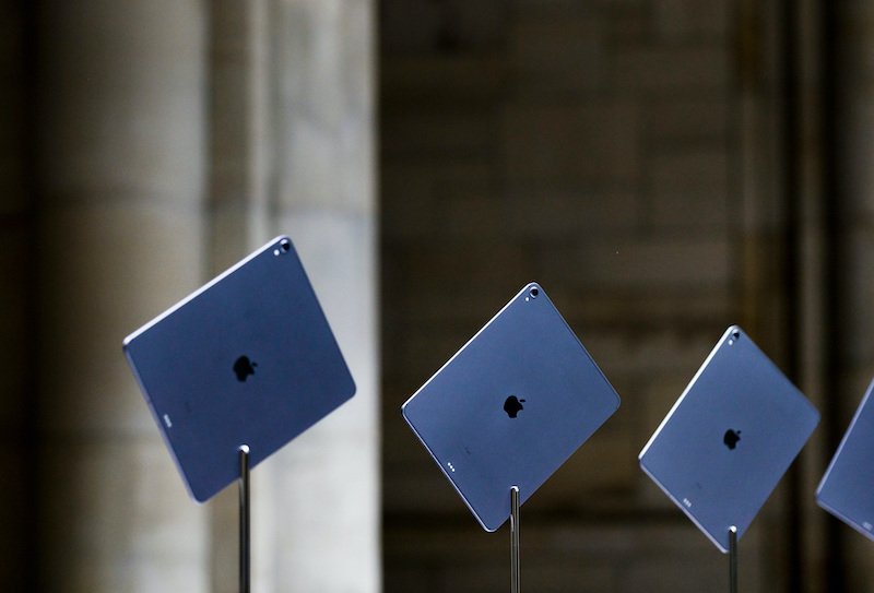 iPads displayed at an Apple event.