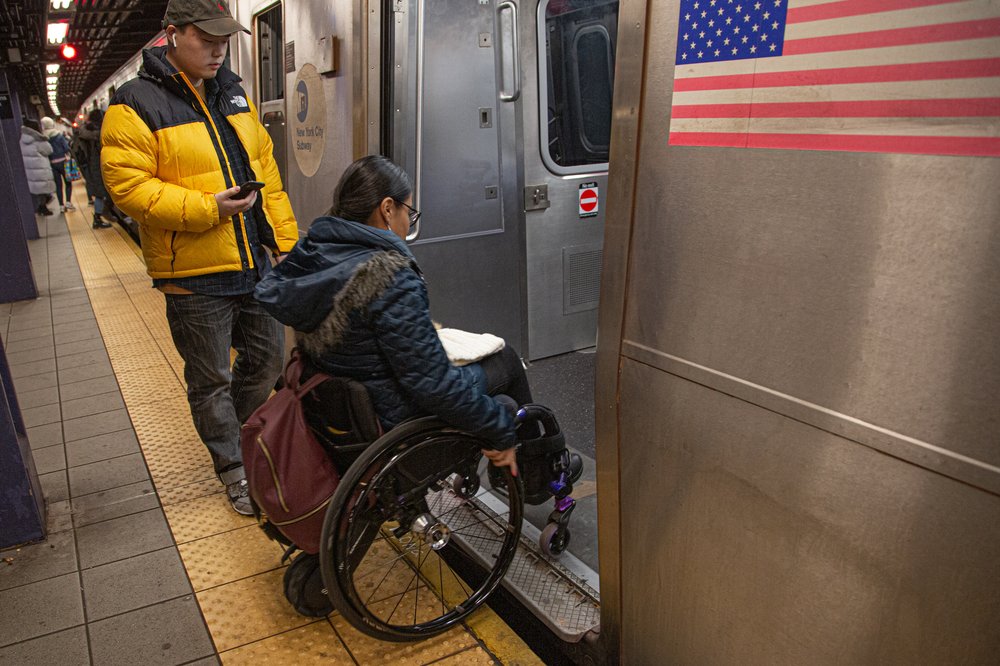 Katherine Valdez uses a wheelchair to commute from her home in Briarwood, Queens, to work in Long Island City.