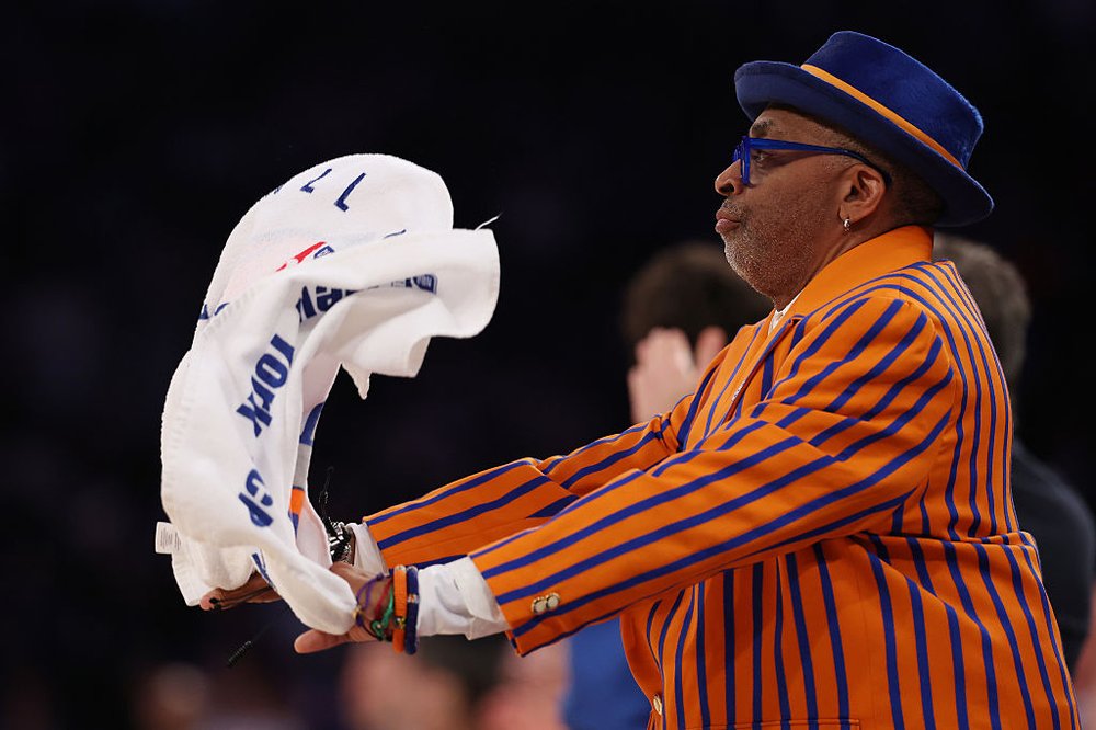 Spike Lee waving a towel at a Knicks game