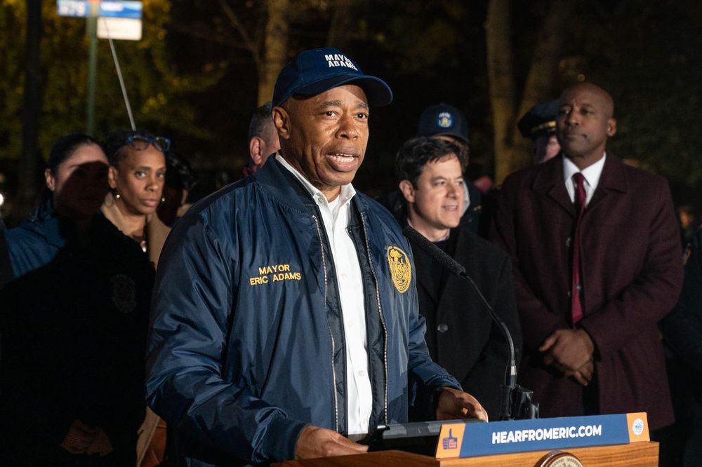 Mayor Eric Adams at a nighttime press conference