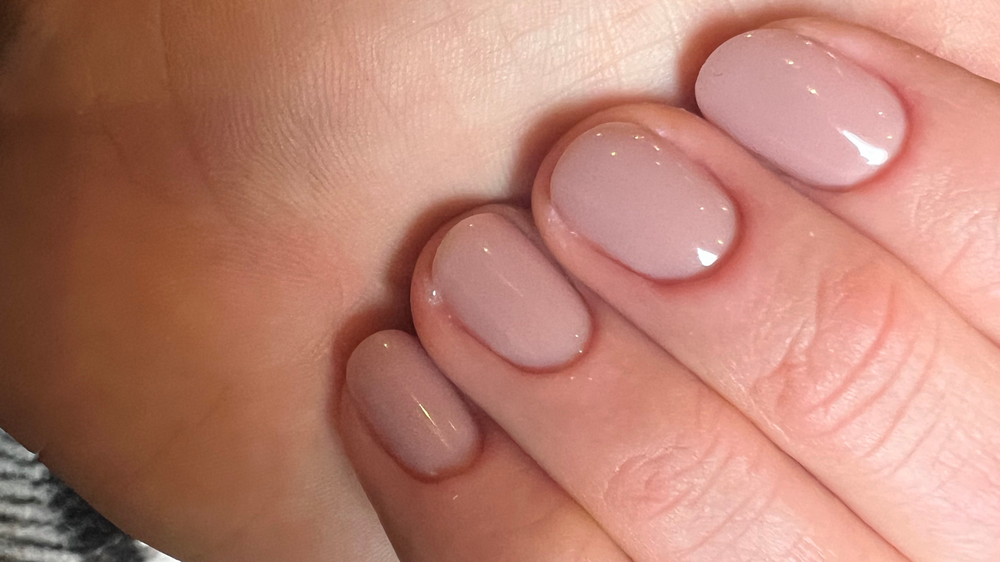 A close-up of a woman's nails.