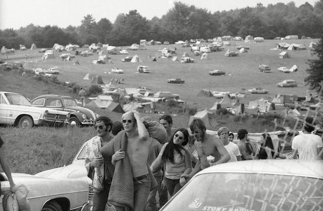Festival-goers leaving Woodstock in 1969. Let's just leave Woodstock in the past.