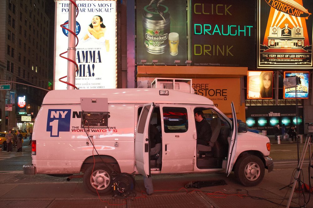 a NY1 news truck in Times Square