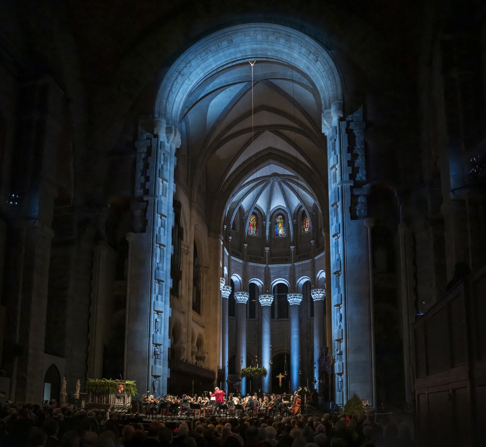 a church dome illuminated in blue lights.