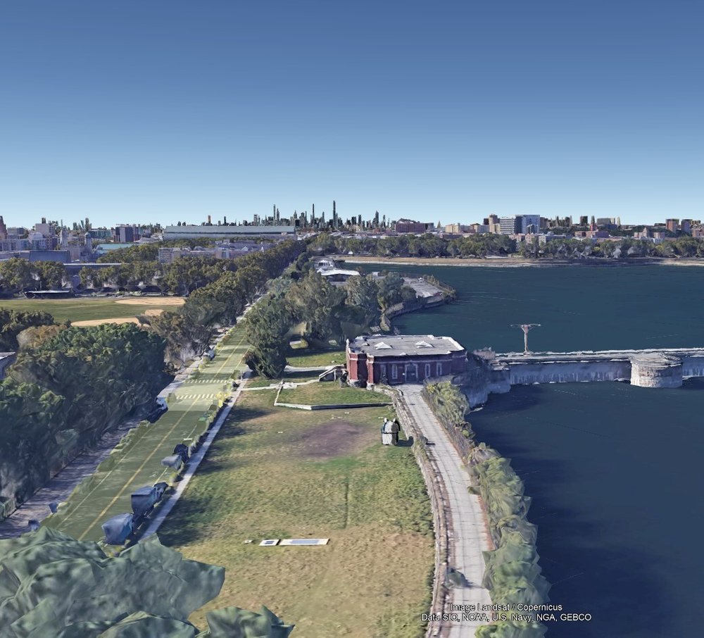 An aerial view of the proposed site for the New York City Public Observatory on the grassy banks of the Jerome Reservoir.