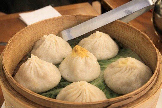 oct2111nanxiang.jpg Best Soup Dumpling: Nan Xiang Dumpling House: Xiao long bao, or soup dumplings, are named in honor of the supremely delicious melted gelatin broth that busts out of the wrapper upon first bite. (XLB are potentially very dangerous to the roof of the mouth, so hasty eaters, proceed with caution.) The XLB at this Flushing dumpling mecca (which does, for what it's worth, offer table service and an English menu) have a wrapper slightly thicker than traditional Shanghai-style, but they're not too doughy, and the pork and crab filling is always fresh. Skip the tourist lines at nearby Joe Shanghai (whose XLB don't have enough soup, anyway) and head here insteadâthough it can get crowded on weekends, the brusque service ensures a lickety-split turnover. 38-12 Prince Street, Flushing // (718) 321-3838