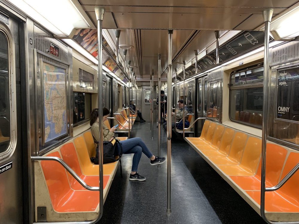 A nearly empty 1 train at rush hour on Tuesday night.