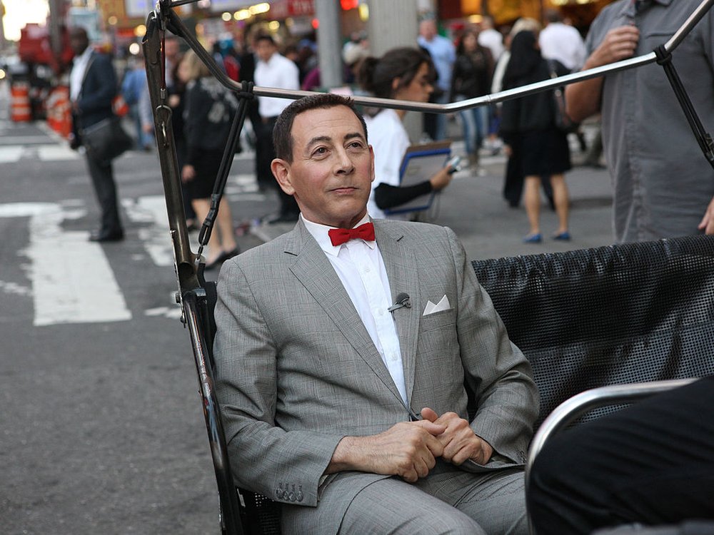 Pee-Wee Herman in a pedicab in New York City