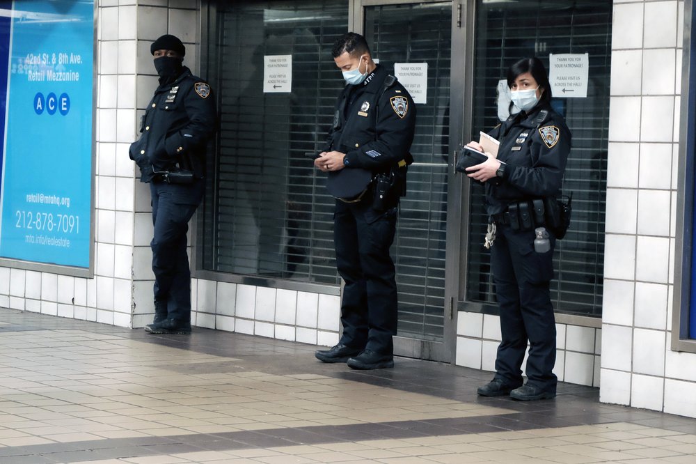 Police patrol in a Times Square subway station on January 19, 2022. Subway patrols increased in 2022 after a series of incidents involving people with a history of mental illness.