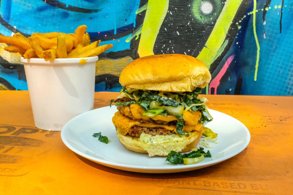 The Green Burger ($15 for a double) and Vegan Cheese Fries ($7)