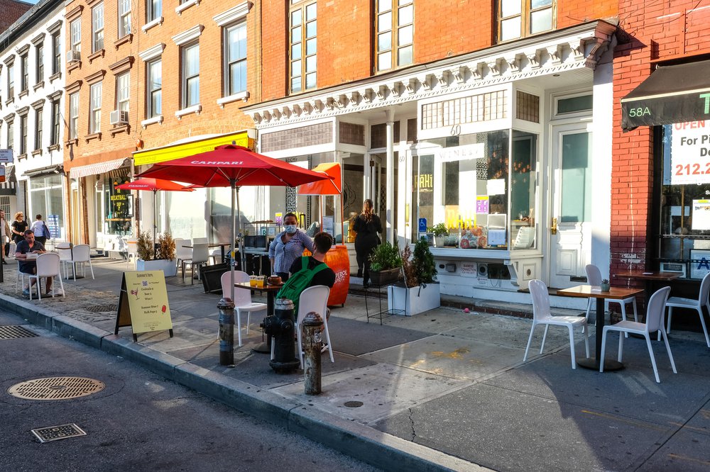 The outdoor tables spaced apart