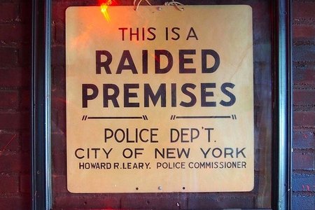 The "raided premises" sign just inside the door at the Stonewall Inn