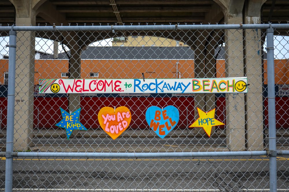 rockmemday-3.jpg Welcome to Rockaway Beach sign on a gate
