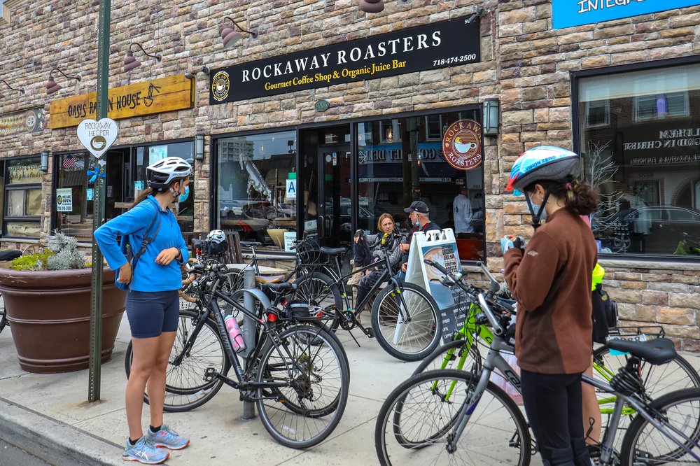rockmemday-52.jpg Rockaway Roasters exterior, with people on bikes outside