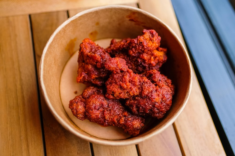 Three piece signature chicken, served with bones and a "Rowdy" level of heat ($9)