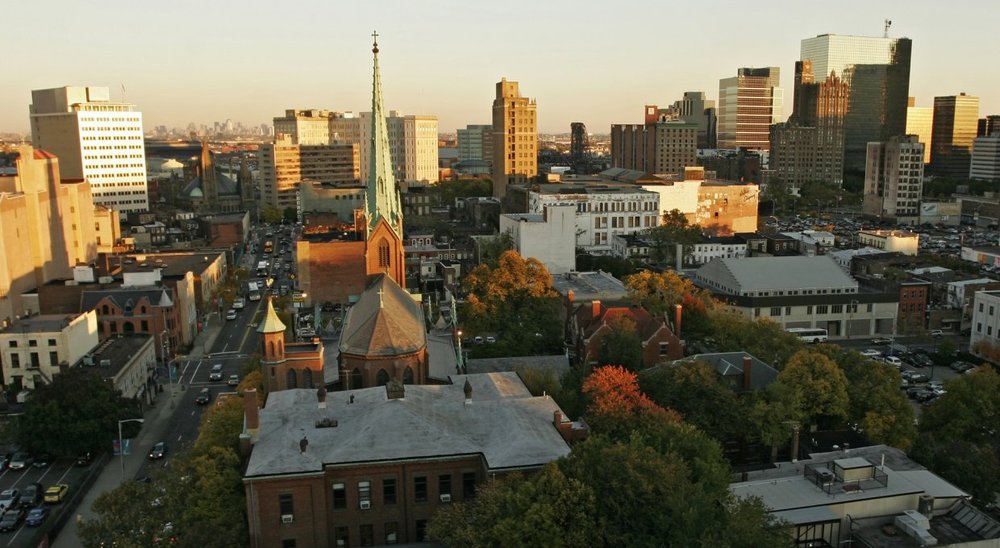 Aerial photo of Rutgers' Newark campus, showing a mix of campus buildings and open space in Newark