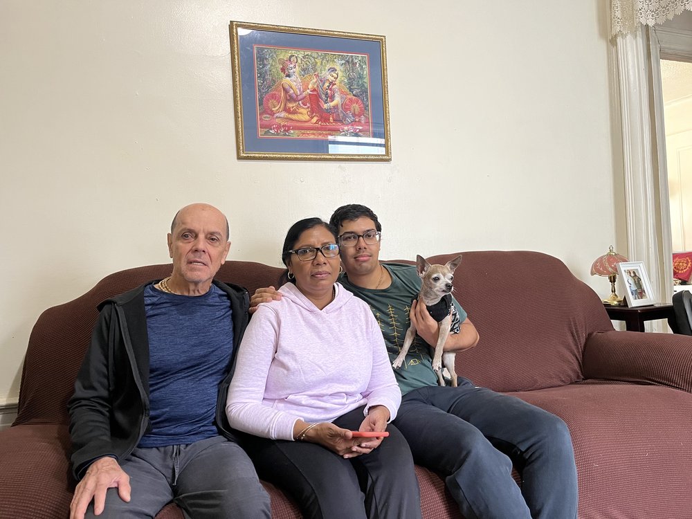 Jorge Santos (left) with wife Shanti and son Krishna. Jorge worked for Maimonides for 13 years before losing his eyesight. Maimonides is evicting the family from their home of 22 years.