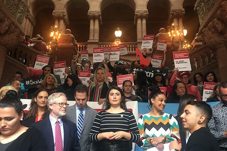Sen. Julia Salazar, Assemb. Richard Gottfried, Assemblymember Dan Quart, Senator Jessica Ramos, and Jessica Raven of Decrim NY pose with demonstrators at the state capitol in Albany on Tuesday.