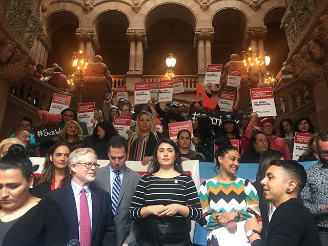 Sen. Julia Salazar, Assemb. Richard Gottfried, Assemblymember Dan Quart, Senator Jessica Ramos, and Jessica Raven of Decrim NY pose with demonstrators at the state capitol in Albany on Tuesday.