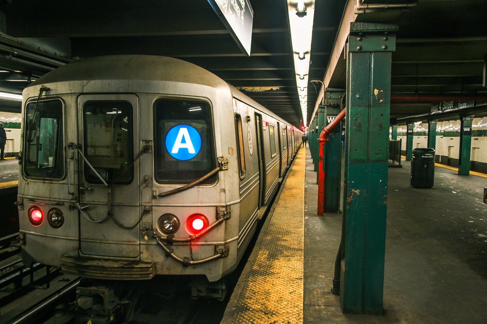 The A strain is stopped at a subway station.