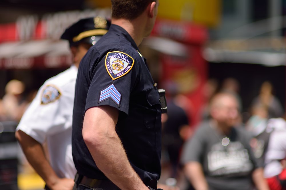 NYPD officers stands guard in Times Square, Manhattan.