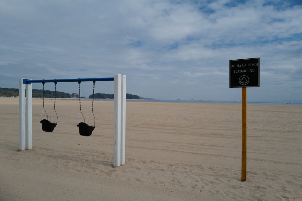 Two swings on the beach