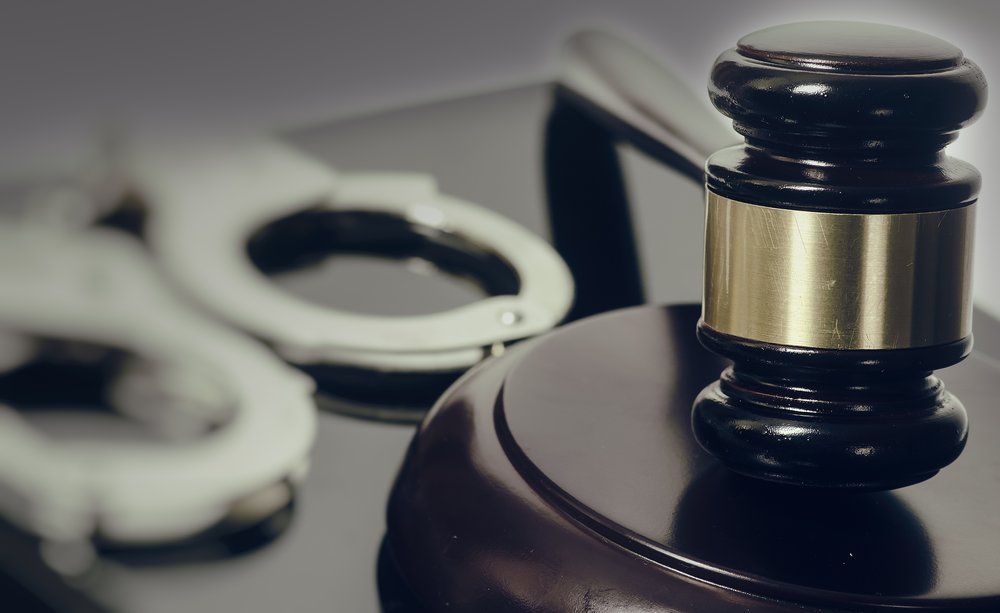 Judge's gavel and handcuffs