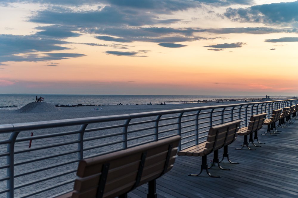 A row of benches on the boardwalk.