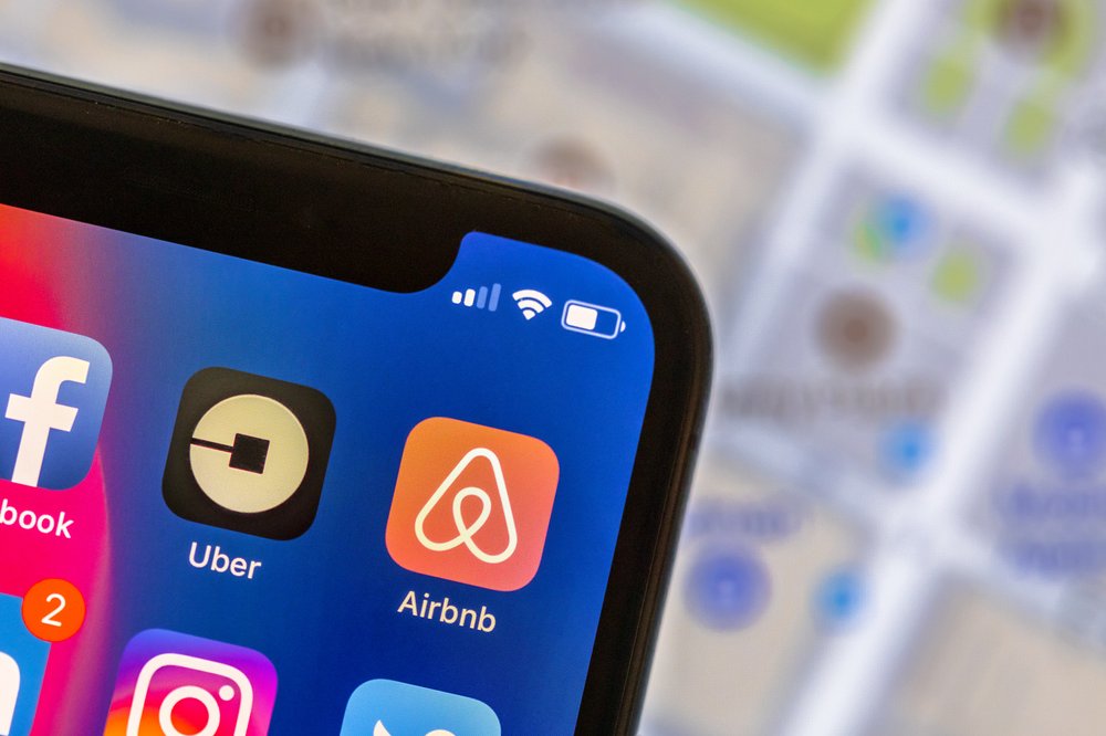 Image of an Airbnb app icon on a screen