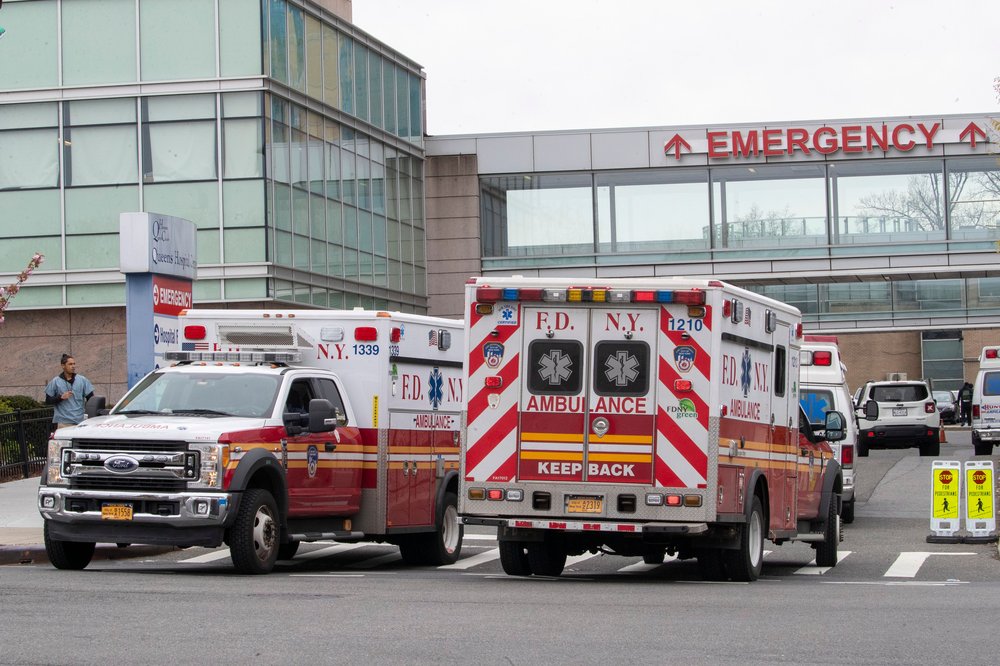 Ambulances are seen entering and leaving the emergency room at Queens Hospital Center on April 20th, 2020.