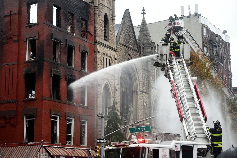 shutterstock_editorial_11184307c.jpg Firefighters continue to extinguish the six-alarm fire the destroyed the Middle Collegiate Church in NYC.